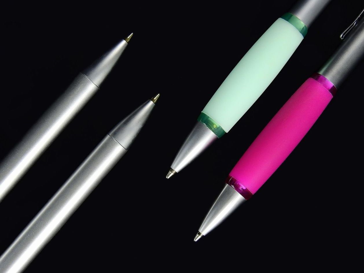 Engraved initials on pen barrel
